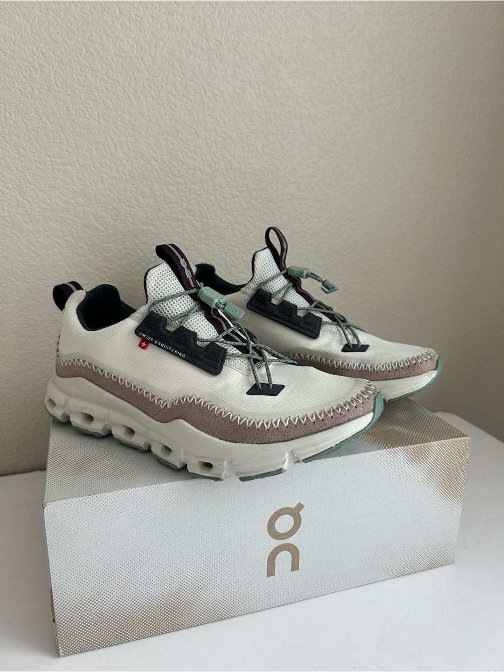 On Running women’s cloudaway Lace-Up Sneakers in White and Light Pink
